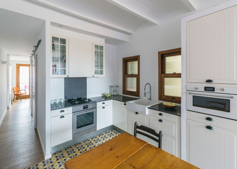 Barcelona apartment renovation by Nook with tiles and window seat-4