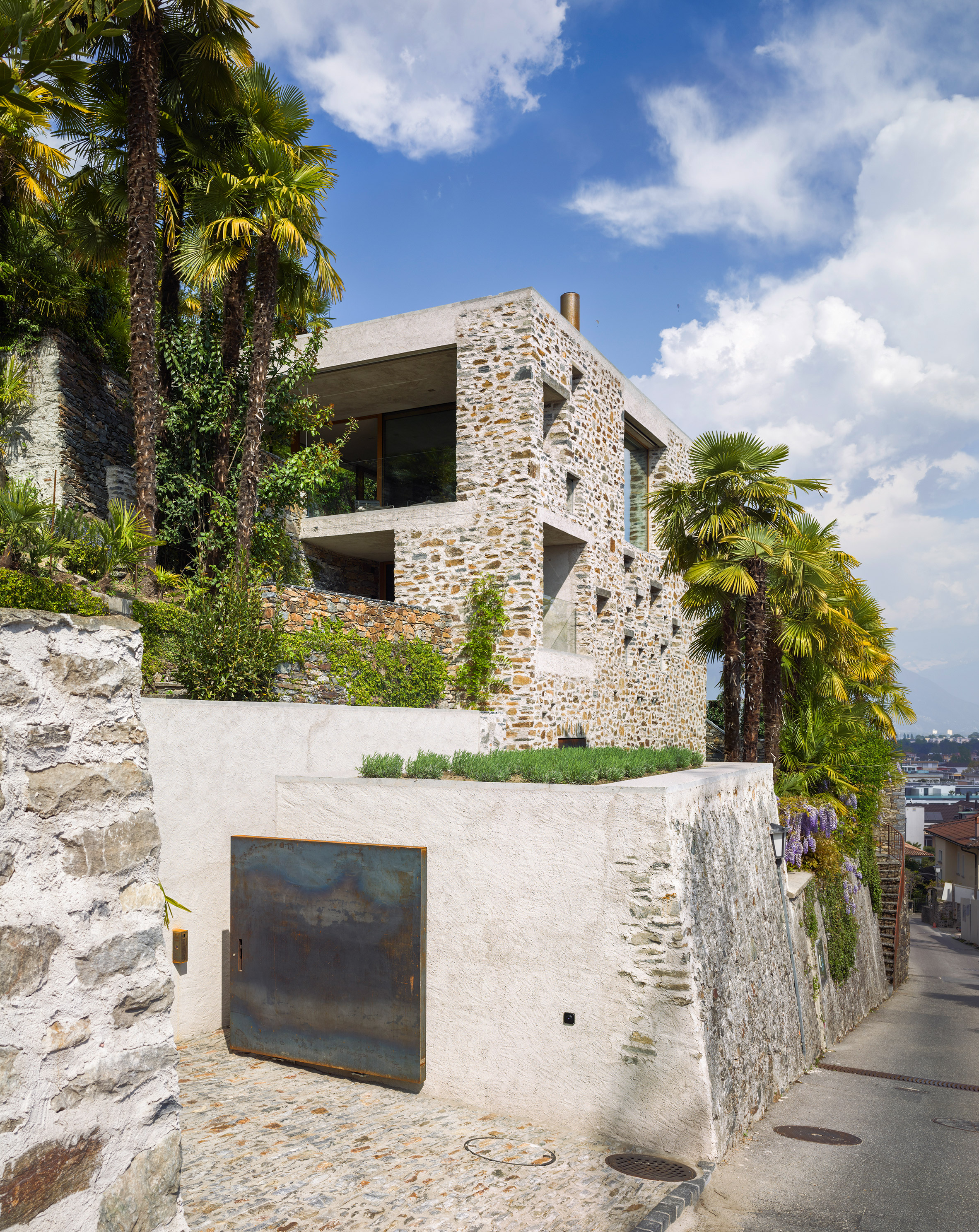Wespi de Meuron Romeo uses stone and plaster for lakeside house-25