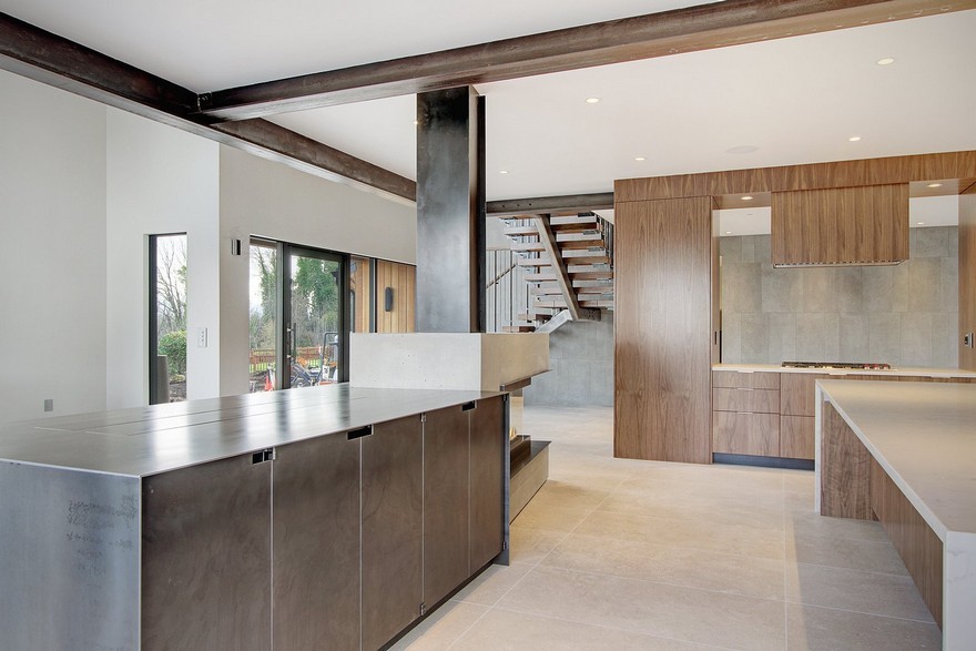 Open Floor Plan Home Featuring a Natural Palette of Steel, Concrete and Walnut-16
