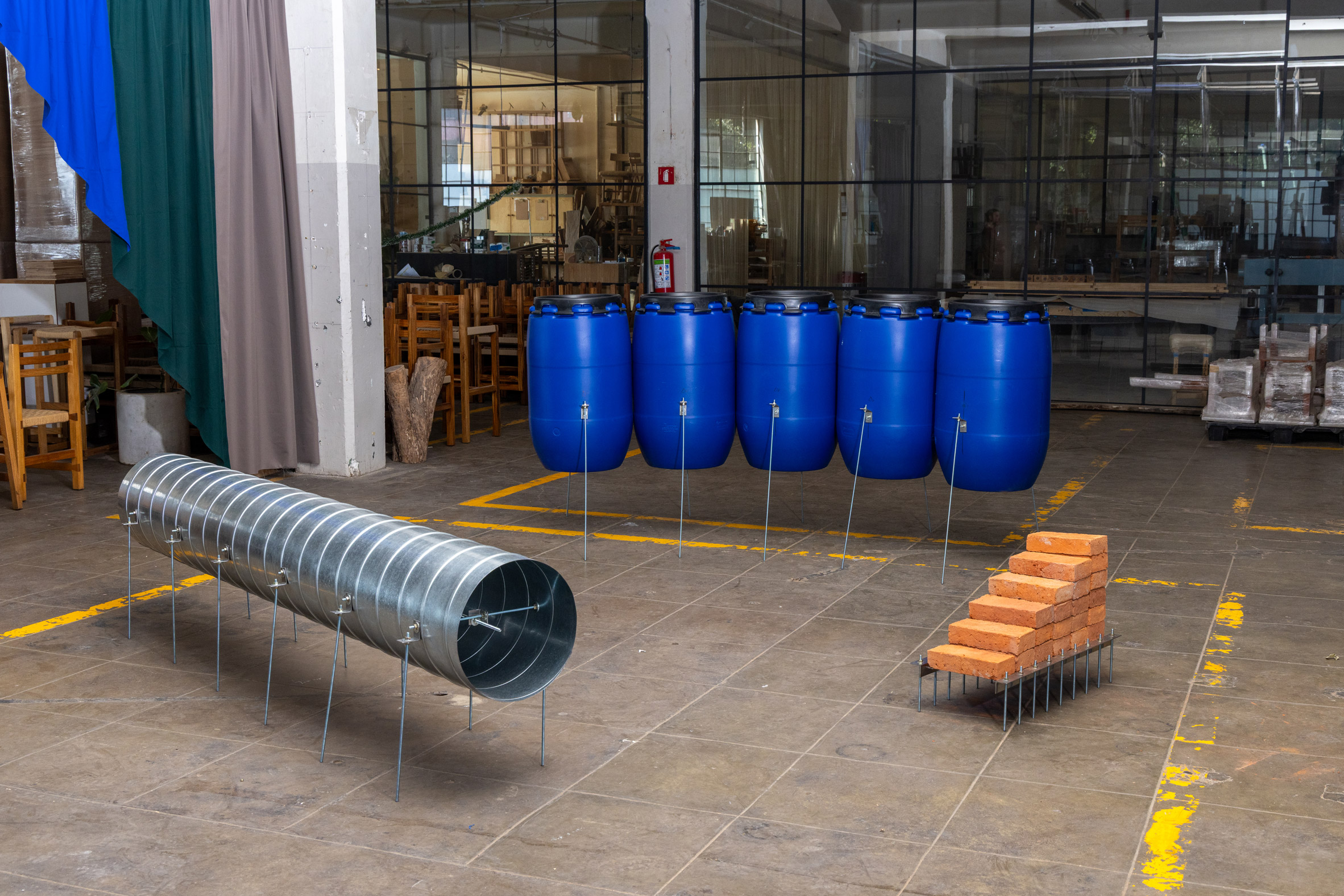 Architects respond to "excess and demolition" at Mexico City art week reuse exhibition-11