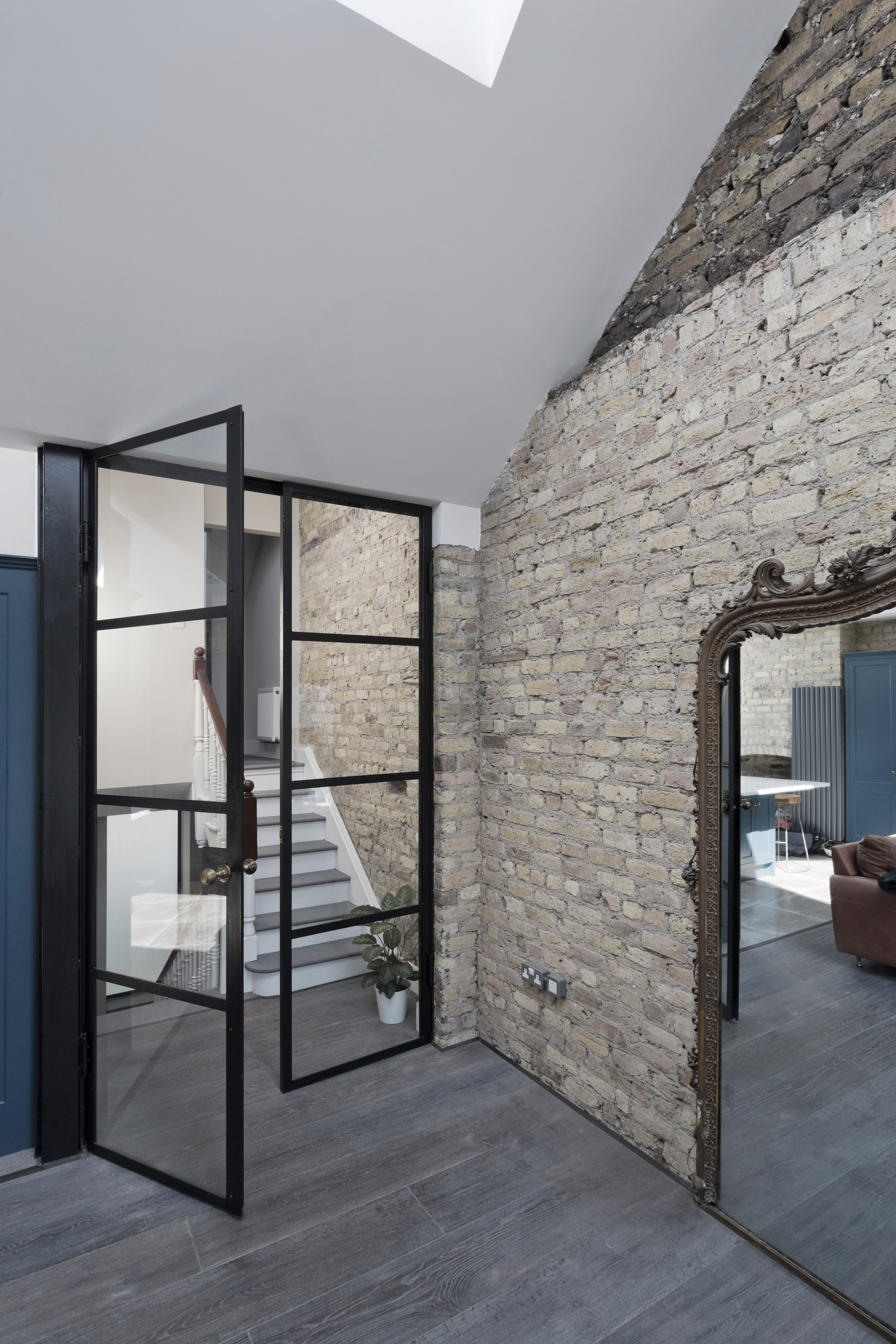 Scullion Architects adds charred-larch tower to terraced home in Dublin-14