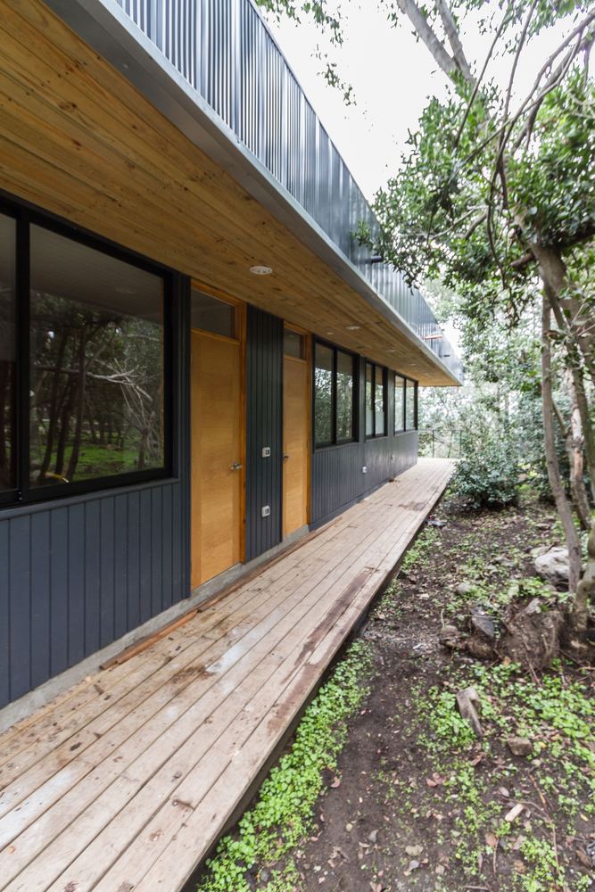 智利奥尔穆埃森林中的悬浮家庭住宅-79