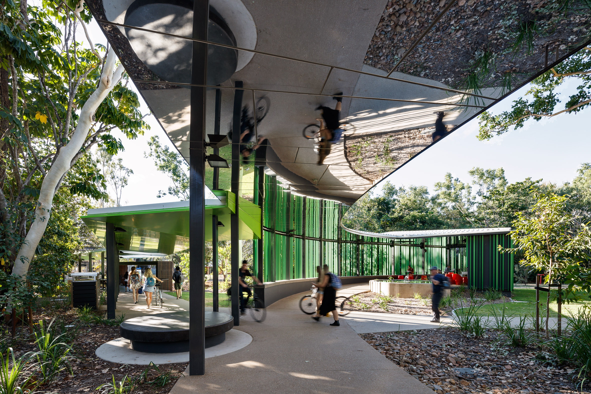 Mirrored ceilings reflect surroundings of walkway at Australian university-9
