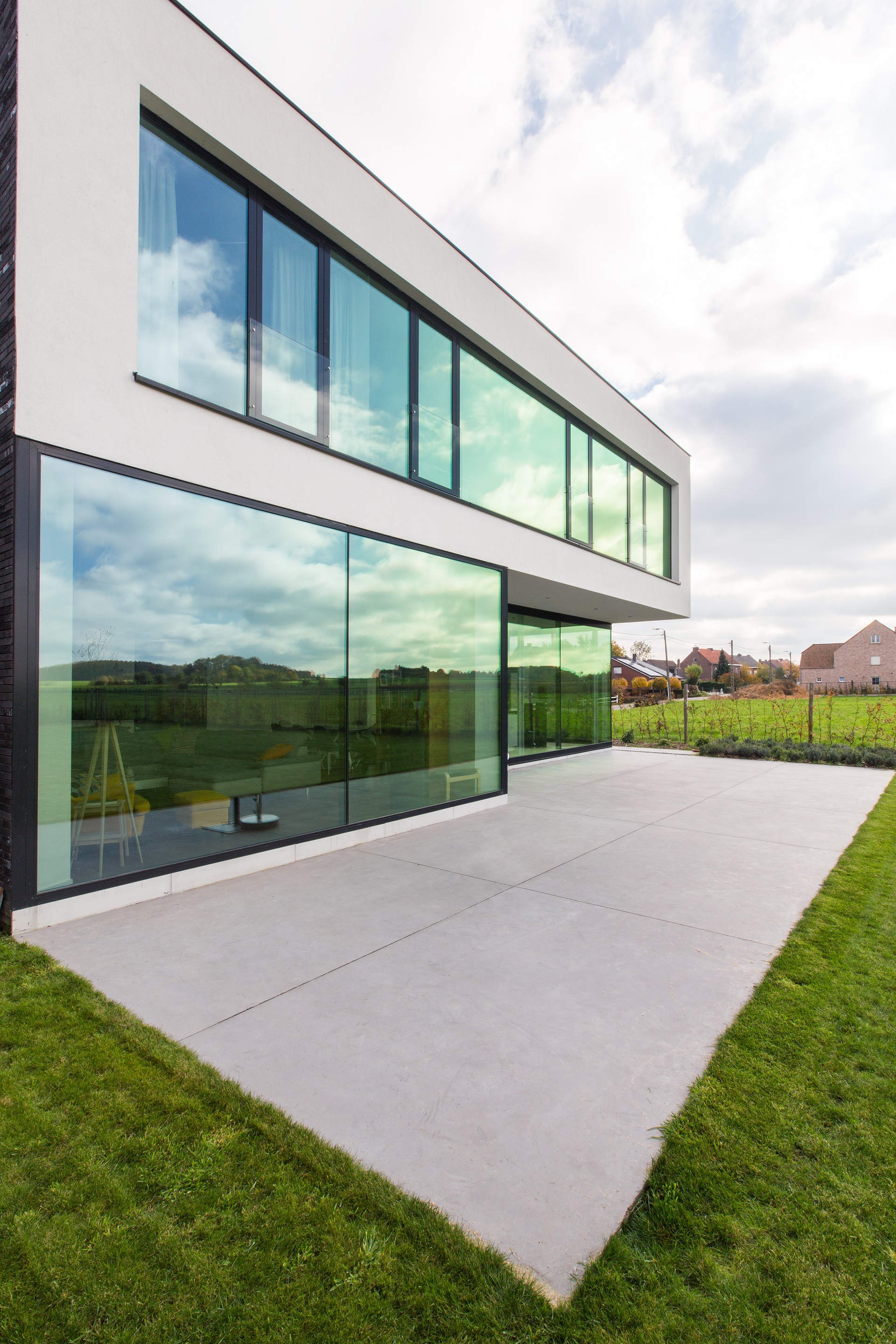 比利时比耶贝克新家庭住宅，简约生活与自然美景的融合-15