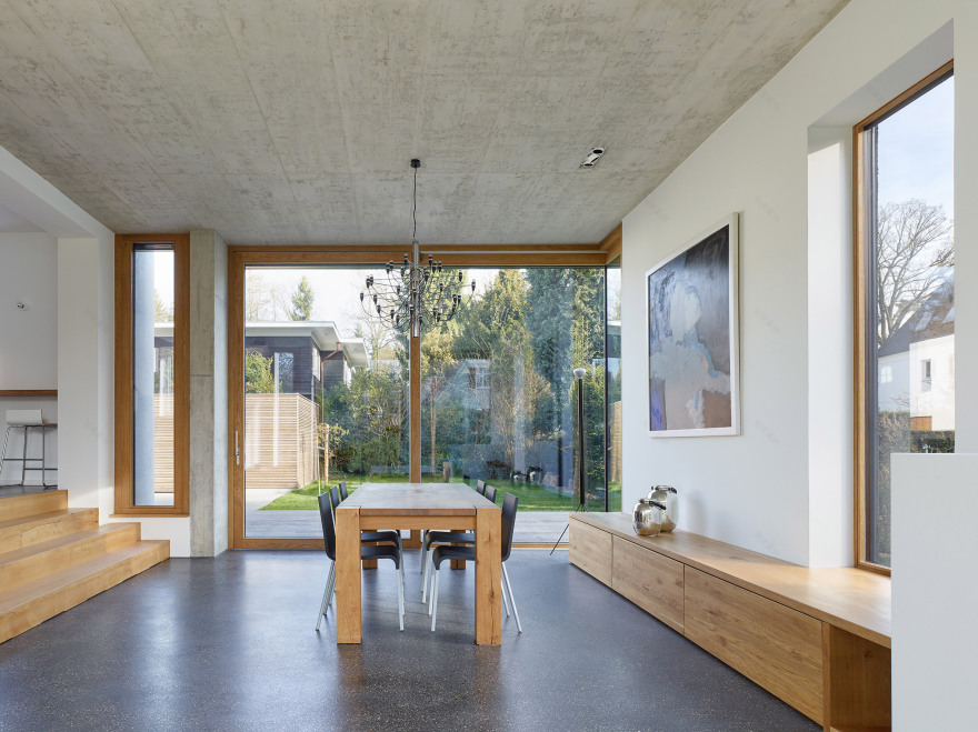 Holzer Architekten adds black extension to 1920s house in Stuttgart-2