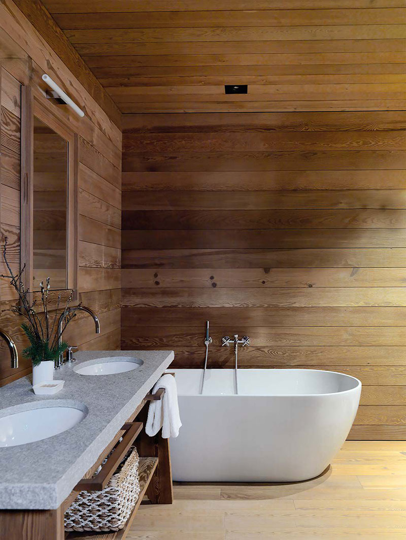 现代瑞士阿尔卑斯山滑雪坡旁小木屋-10