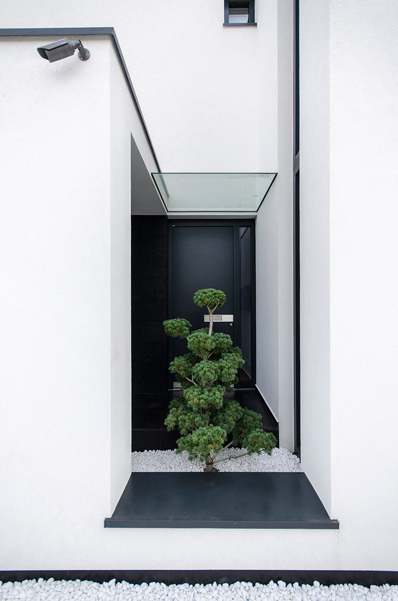 罗马尼亚 C 住宅 | 巧妙利用立面设计实现光影平衡-12