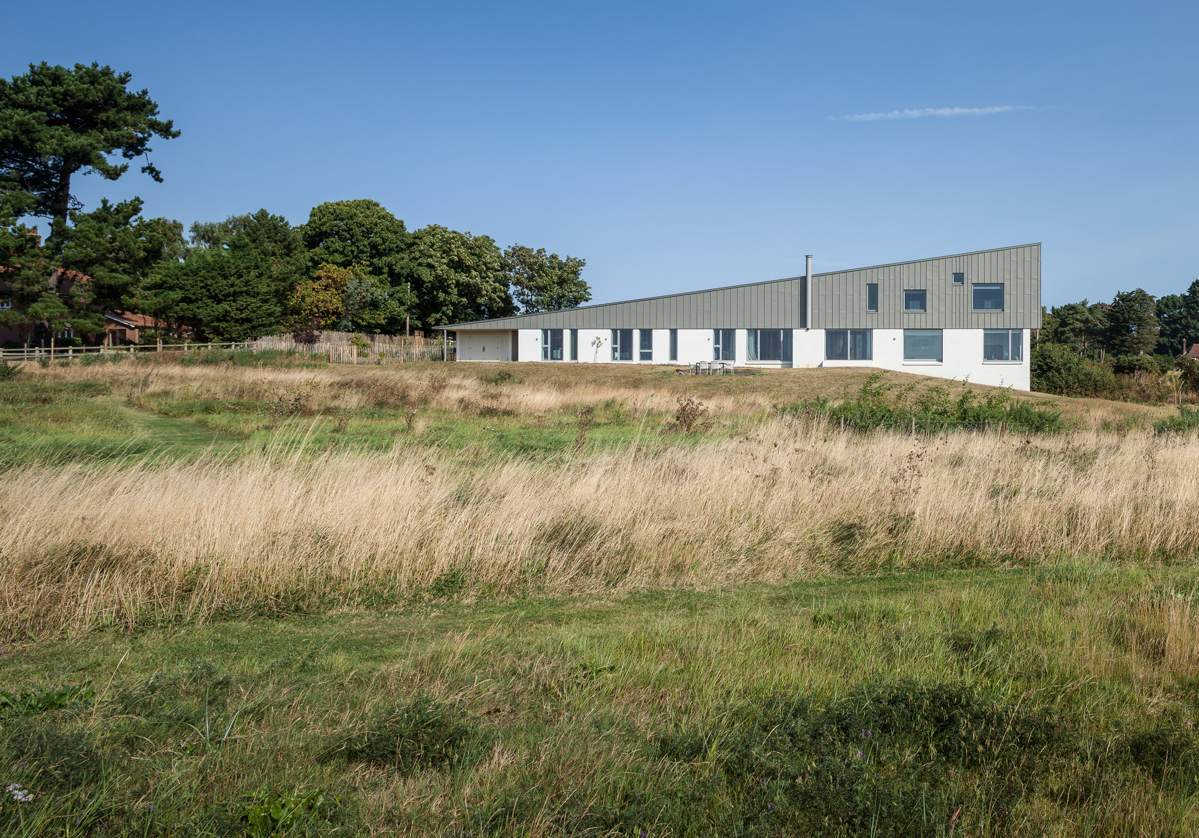 Mole Architects builds house "like a seagull's wing" on Suffolk coast-3