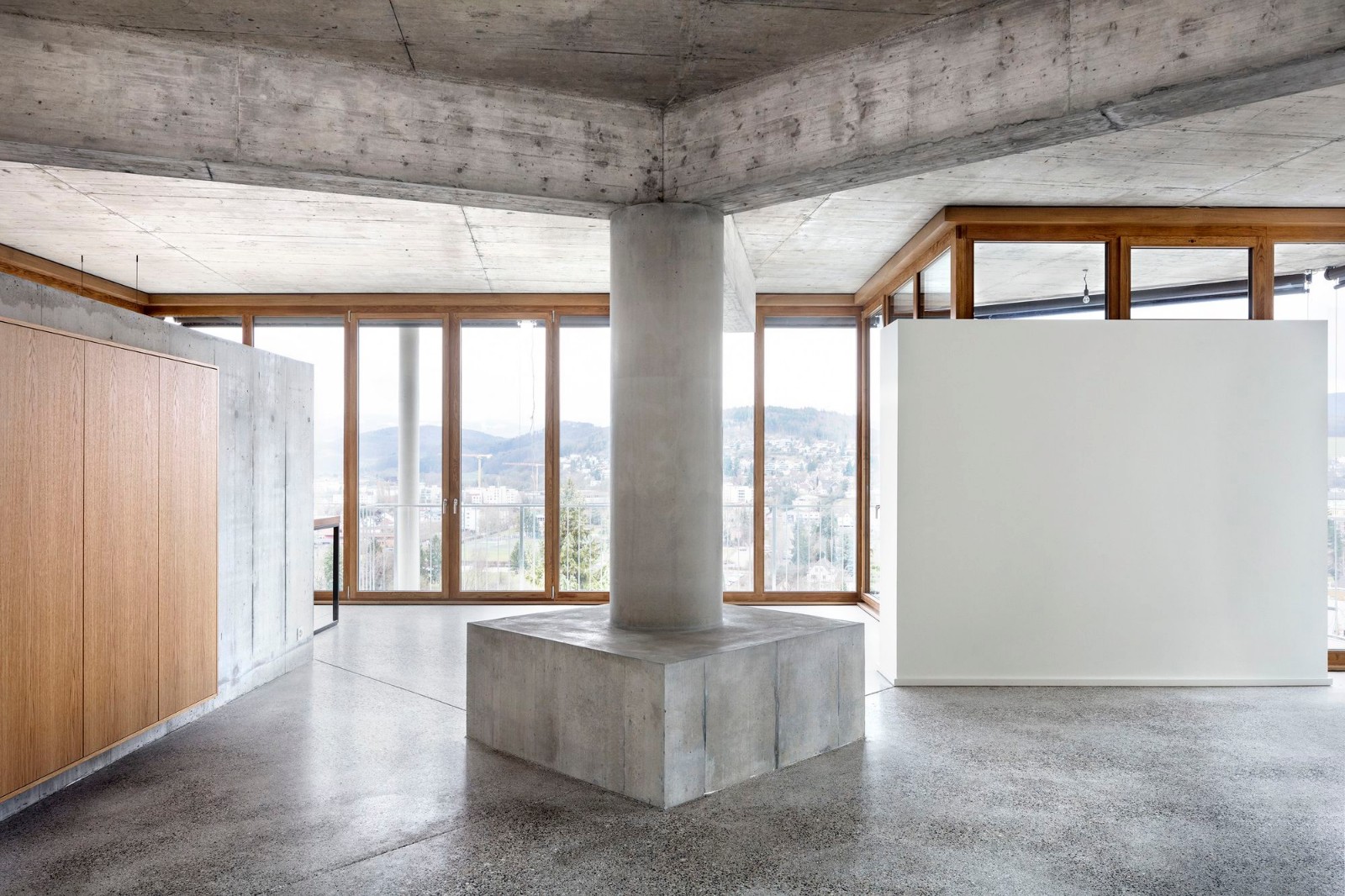 瑞士斜坡上的方形平台极简住宅-8