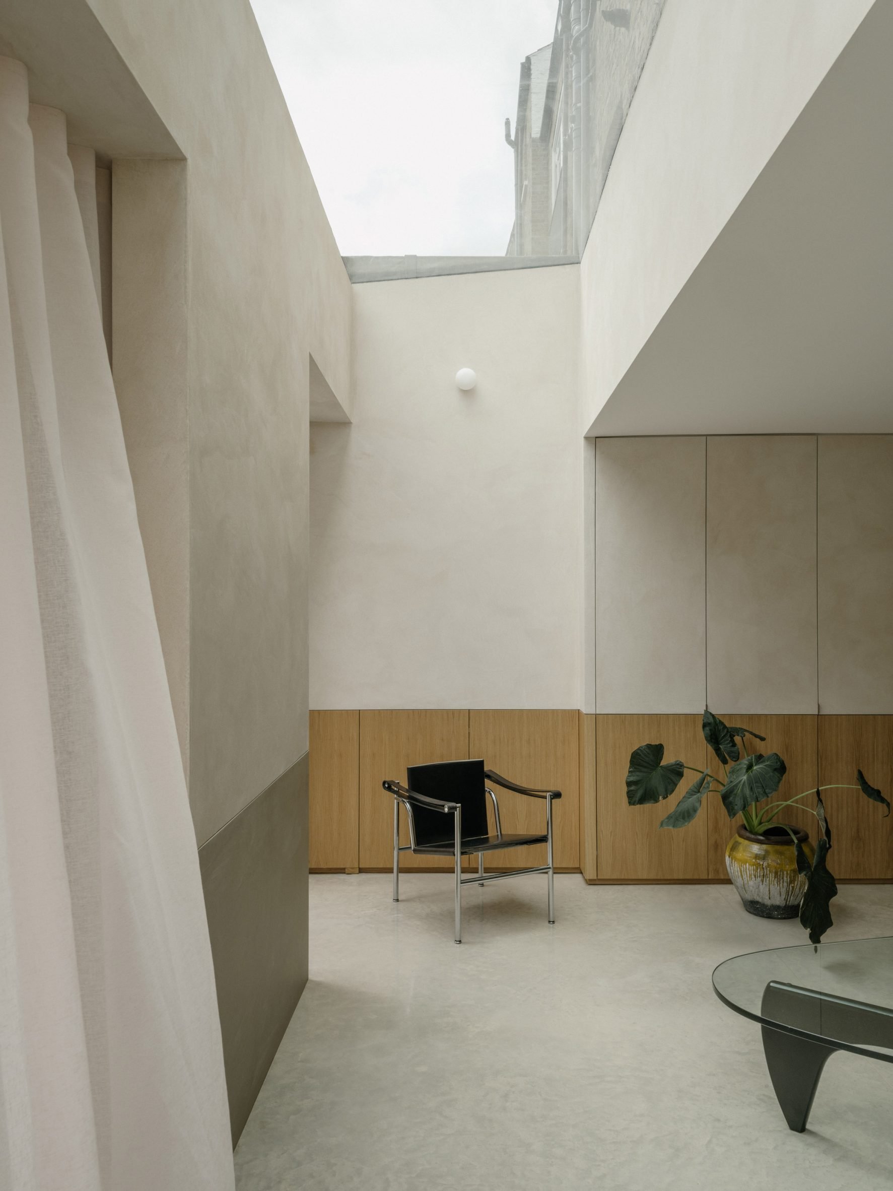 DHaus brings "sense of openness" to Datum House with wall-to-wall skylight-11