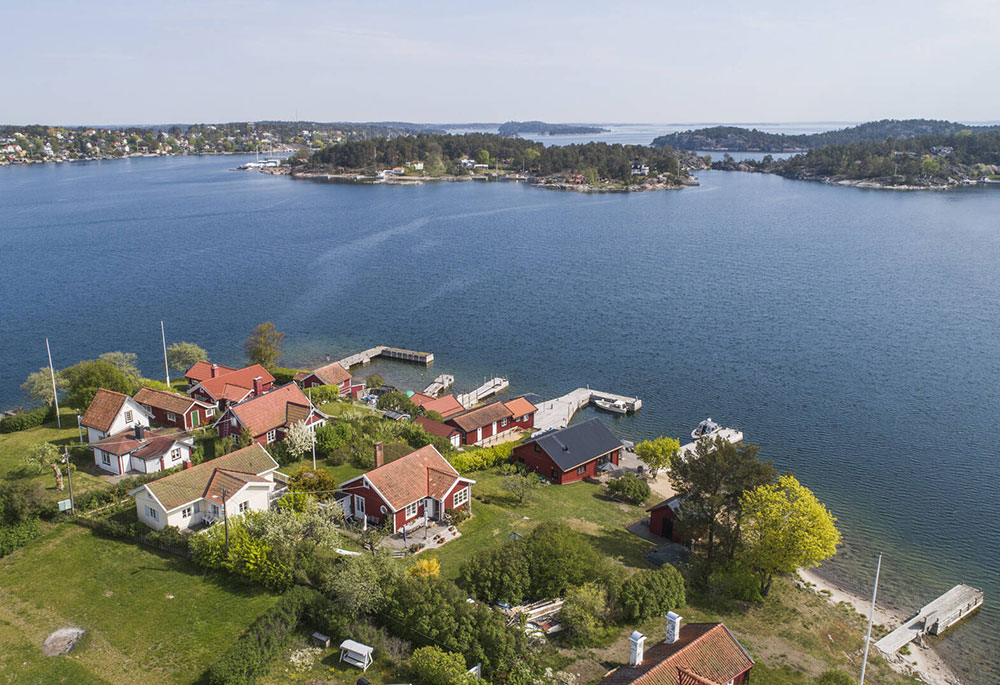 瑞典海岸小岛的工业风红色美墅-30