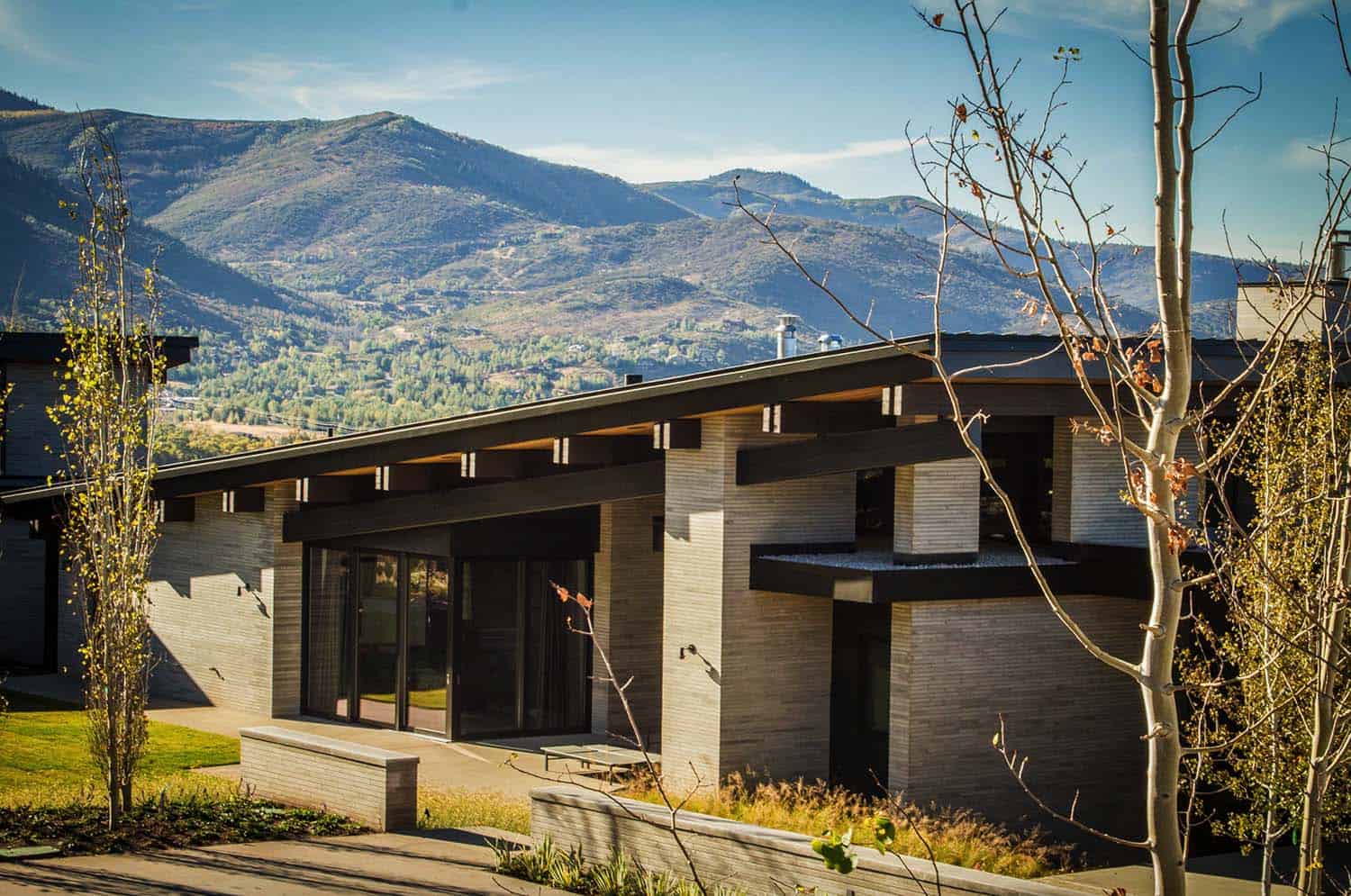 Majestic mountain home of stone and glass dominates its Utah landscape-5