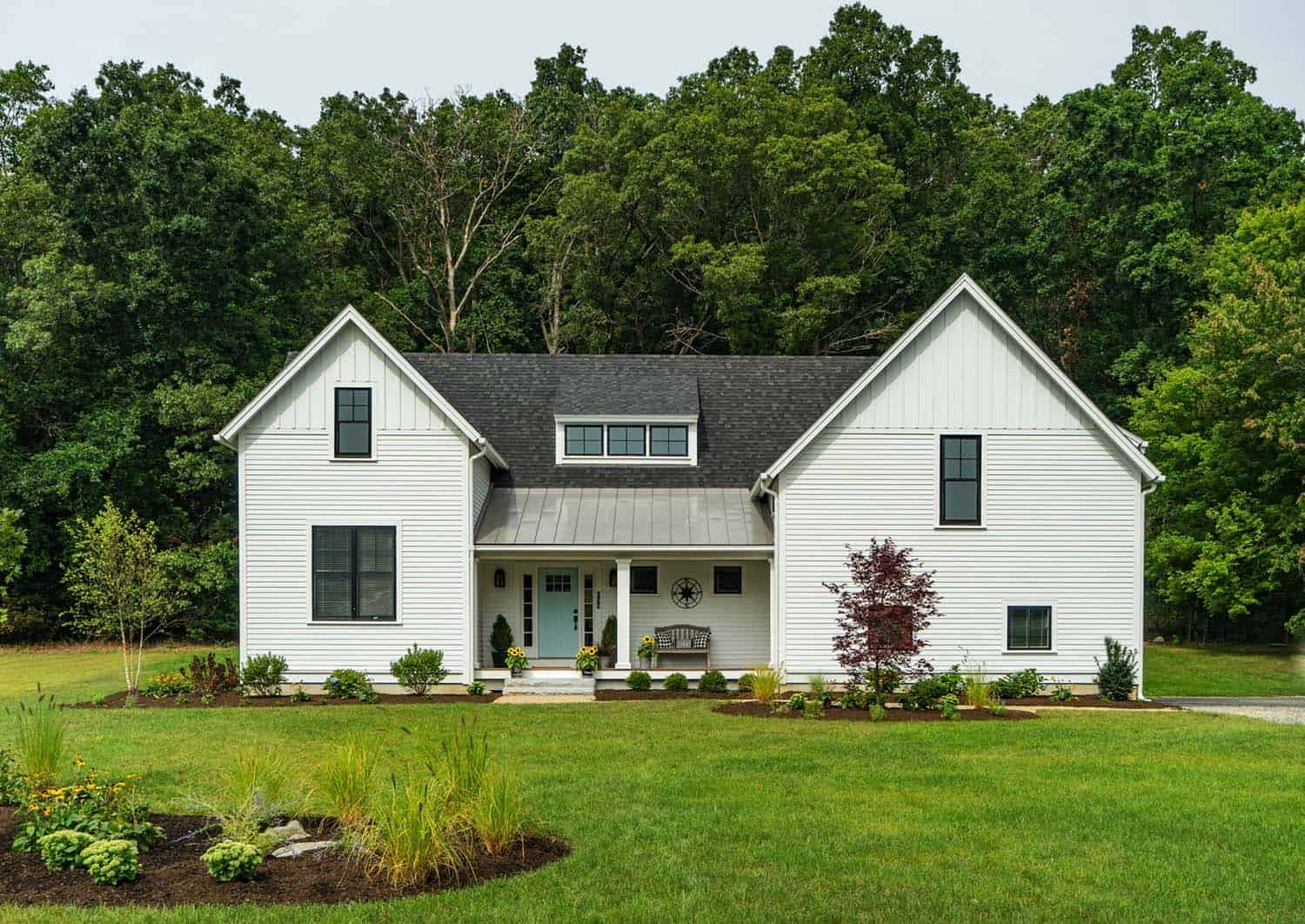 Modern farmhouse style nestled in an idyllic woodsy New England setting-0