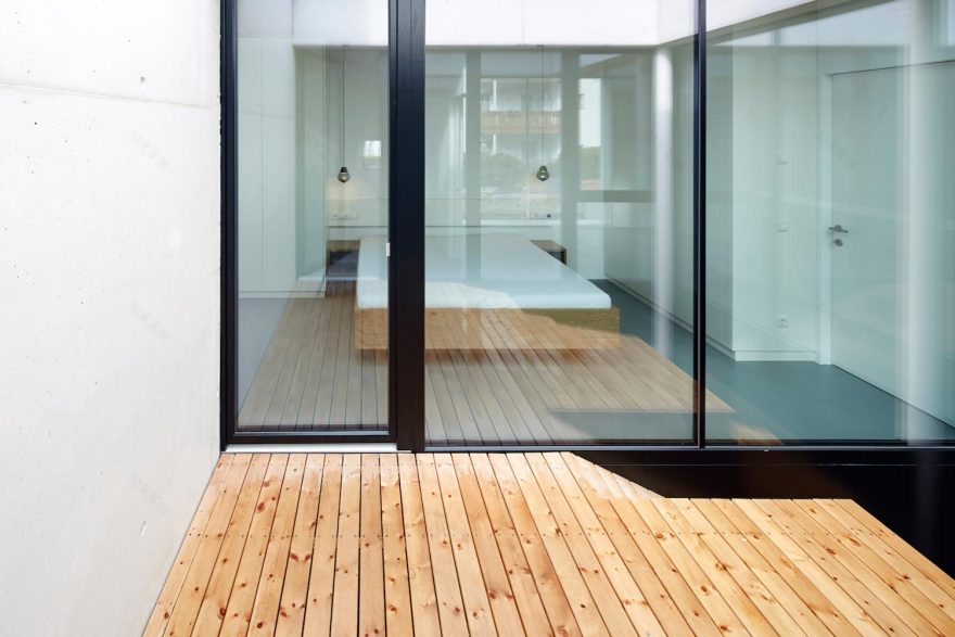 Concrete house uses old walls to create private patio allowing to add full glass walls to the residence CAANdesign Architecture and home design blog-13