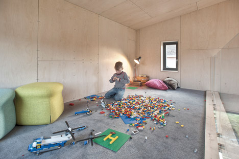 TYIN Tegnestue's lopsided house extension creates extra space upstairs-19