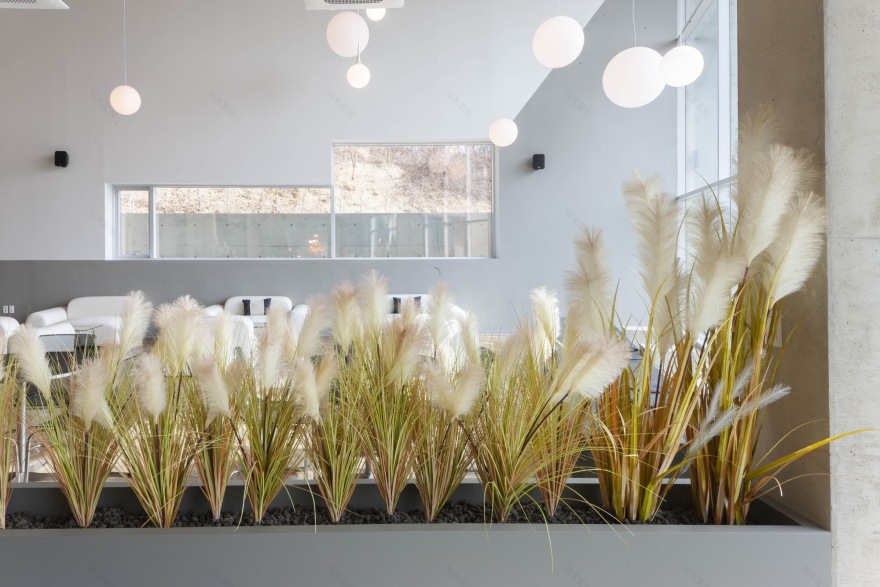 Cormeum Café and Neighborhood Facility / KARO Architekten-33