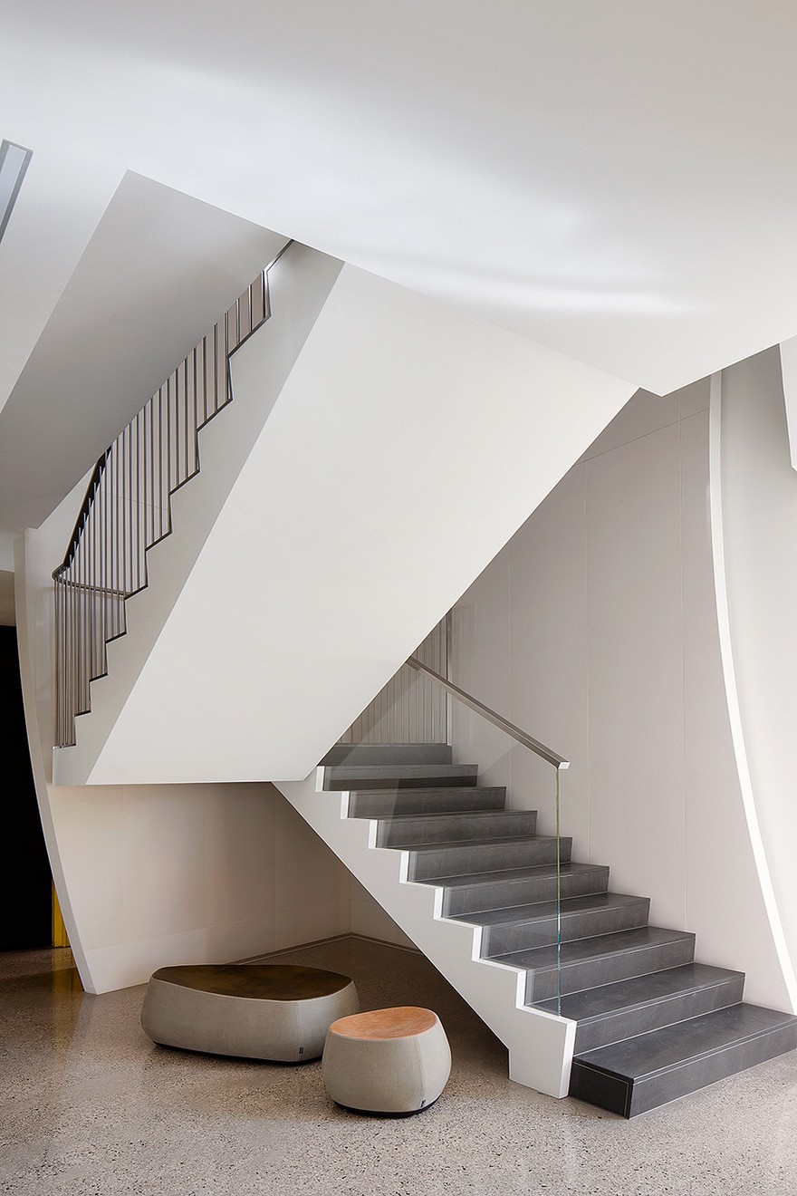 Unconventional House With Elliptical-Shaped Walls That Create New Spatial Perspectives-32