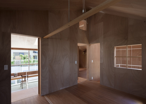 House in Kawanishi by Tato Architects with hipped roof and stilts-18