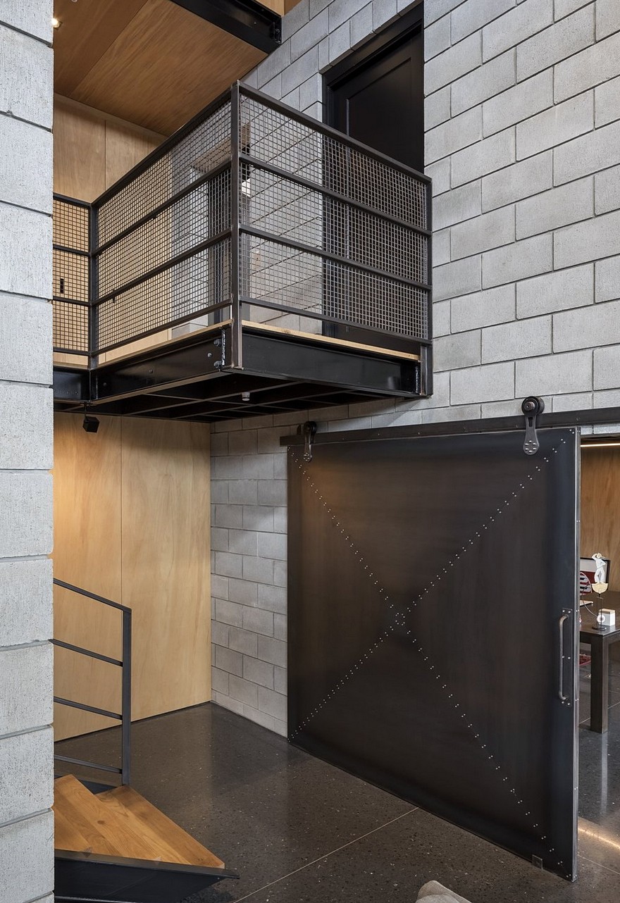 Double Height Living Spaces Add Drama to This Industrial-Style House-16