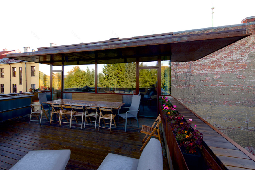 Weathering steel panels create rusty walls for house in Oslo's old town-8