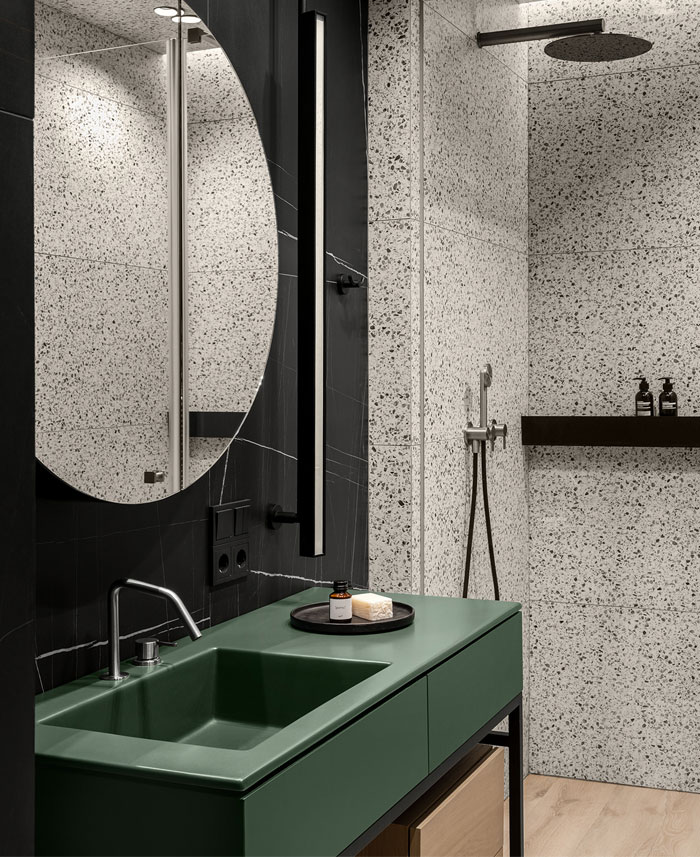 Green L-shaped Kitchen in Kyiv Apartment by Nadya Chabannaya - InteriorZine-8