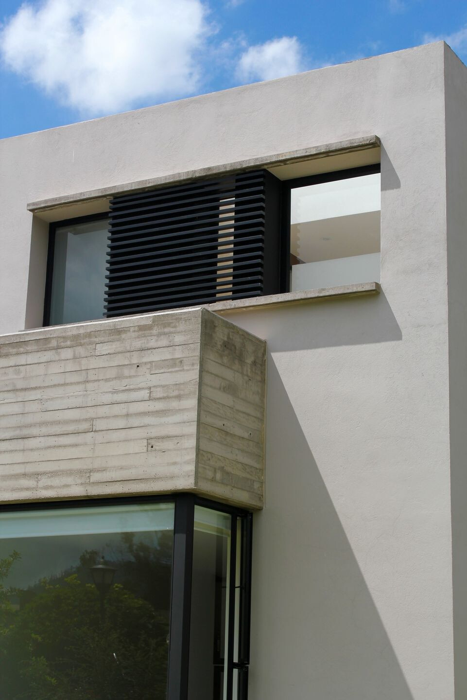 哥伦比亚 L 型别墅 · Campuzano Arquitectos 的室内外一体化设计-25