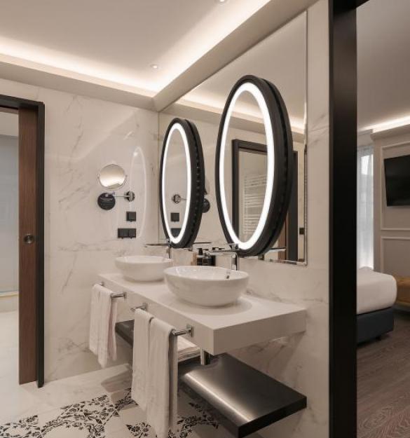 欧洲之星里斯本海湾酒店（注：Eurostars一般指欧洲之星酒店集团，Bai·a推测是葡萄牙语海湾baía的错误写法，结合语境这样翻译较为合适，但纯字面内容主要是品牌和地名，严格来说直接音译欧罗之星里斯本拜阿更准确） 丨PF1 Interiorismo Contract-40