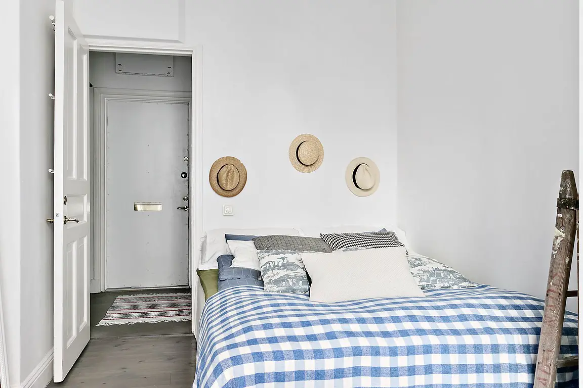 巧用家具打造 52 平米公寓的自行车收纳空间-13