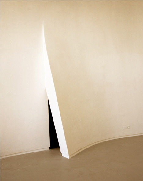 Next Office covers house near Tehran in a curved concrete facade-30