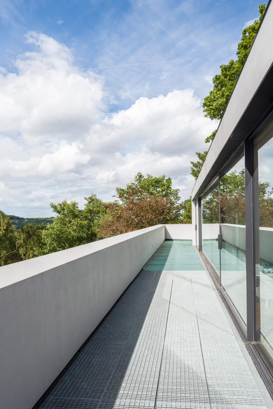 Guard Tillman Pollock slots modernist-styled Holm House behind Highgate home-11