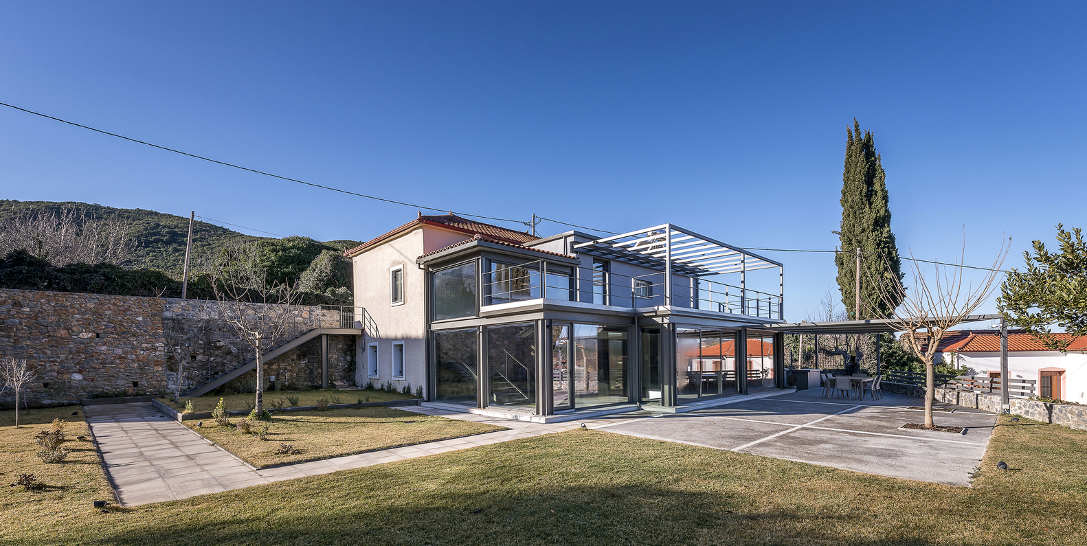 希腊山间住宅的现代钢结构玻璃延伸-8