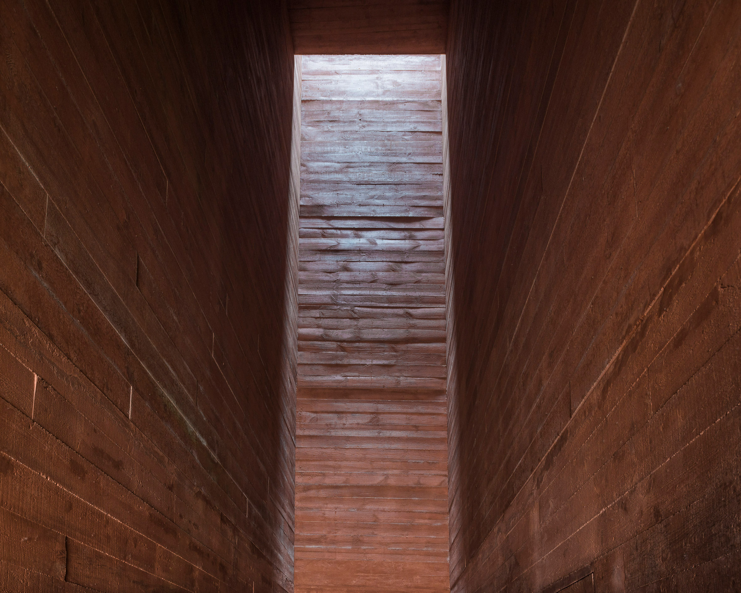 BBGK Architekci uses stained concrete walls to create Katyn Museum inside Warsaw barbican-9