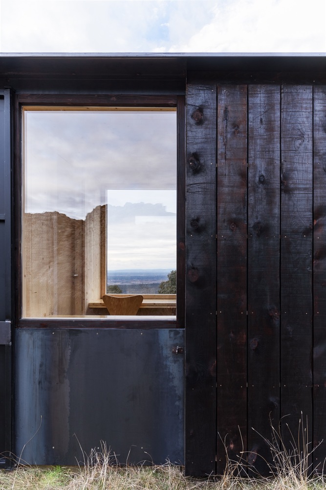 西班牙文化遗址旁的可逆式木钢展馆-30