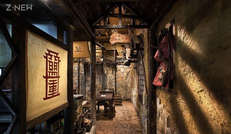 《传奇》游戏特色融入长沙盟重烧烤店设计，展现独特室内空间-3