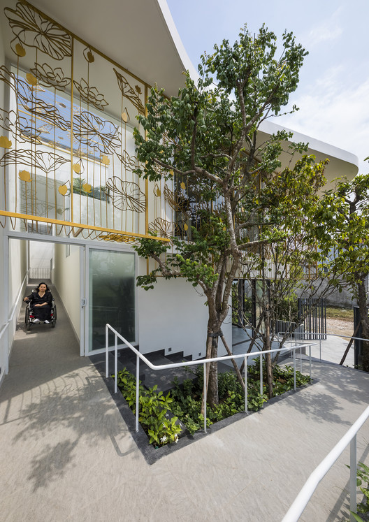 莲意盎然 · 越南残疾女儿的家庭温馨居-18