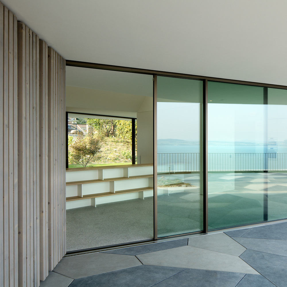 瑞士 Hauterive 湖畔混凝土与玻璃的现代住宅-80