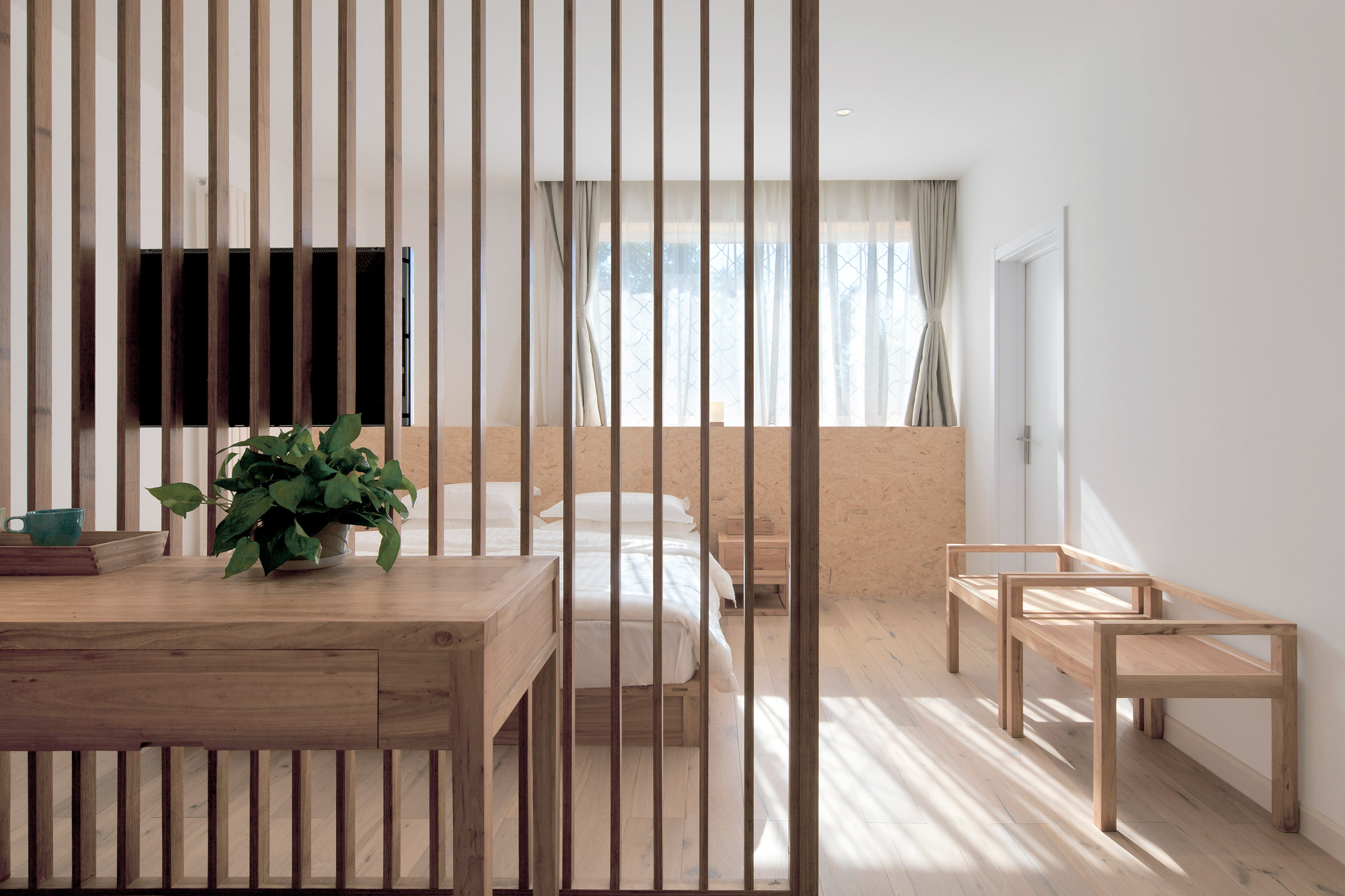 Penda inserts house-shaped opening into facade of hotel in Beijing hutong-28