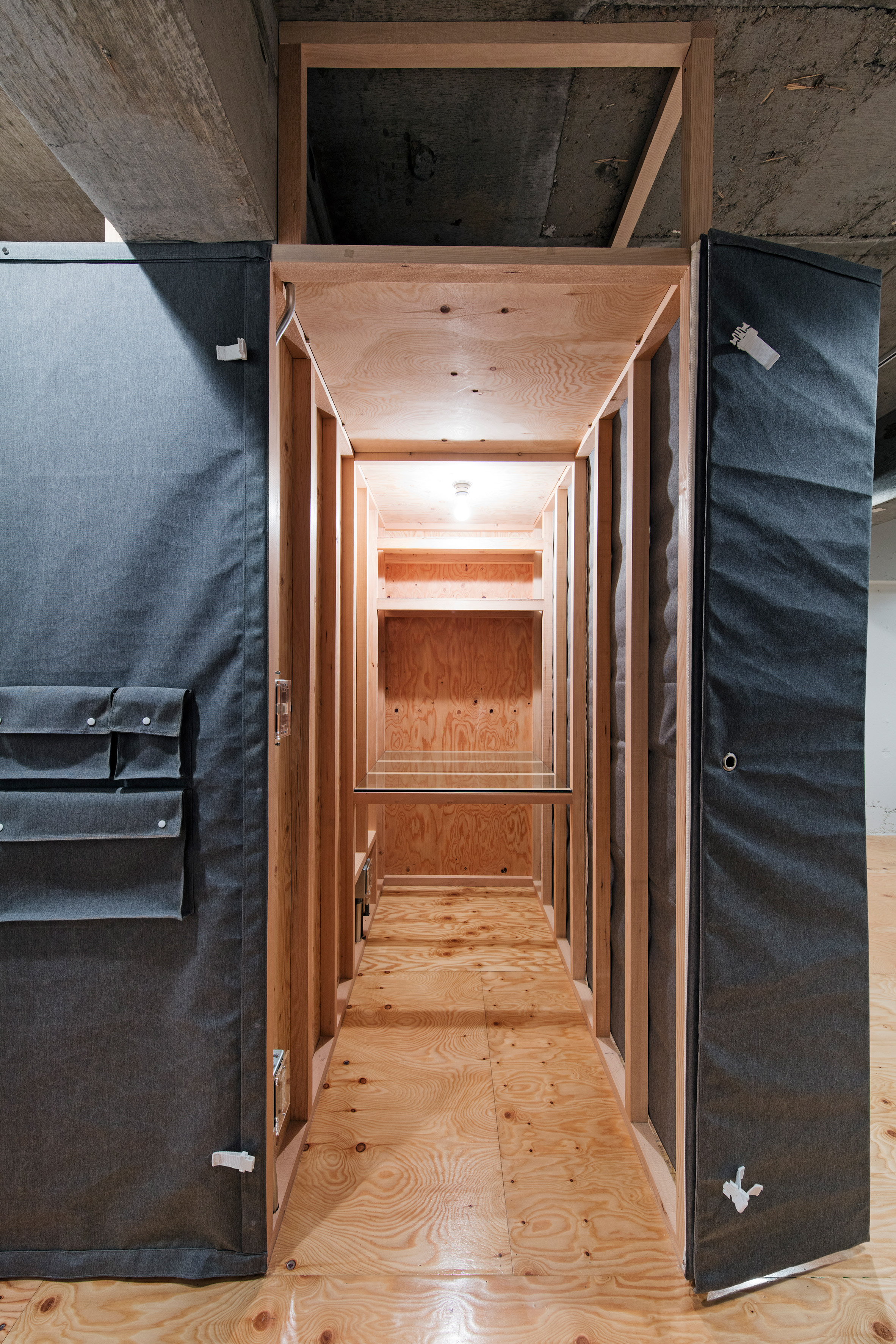 Renovated apartment in Tokyo has storage pockets sewn into its walls-5