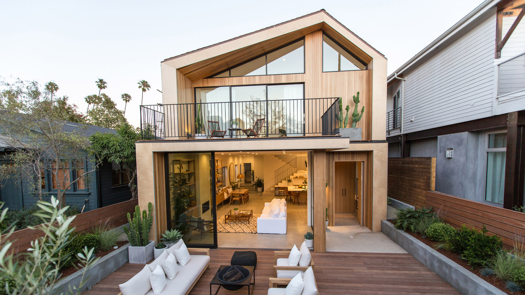 Askew pitched roof and outdoor lounge feature in Venice Beach house by Electric Bowery-0