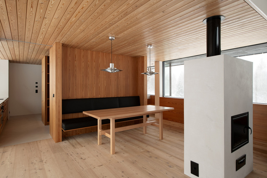 Stone cellar in Estonian forest forms base for wooden Põro House-27