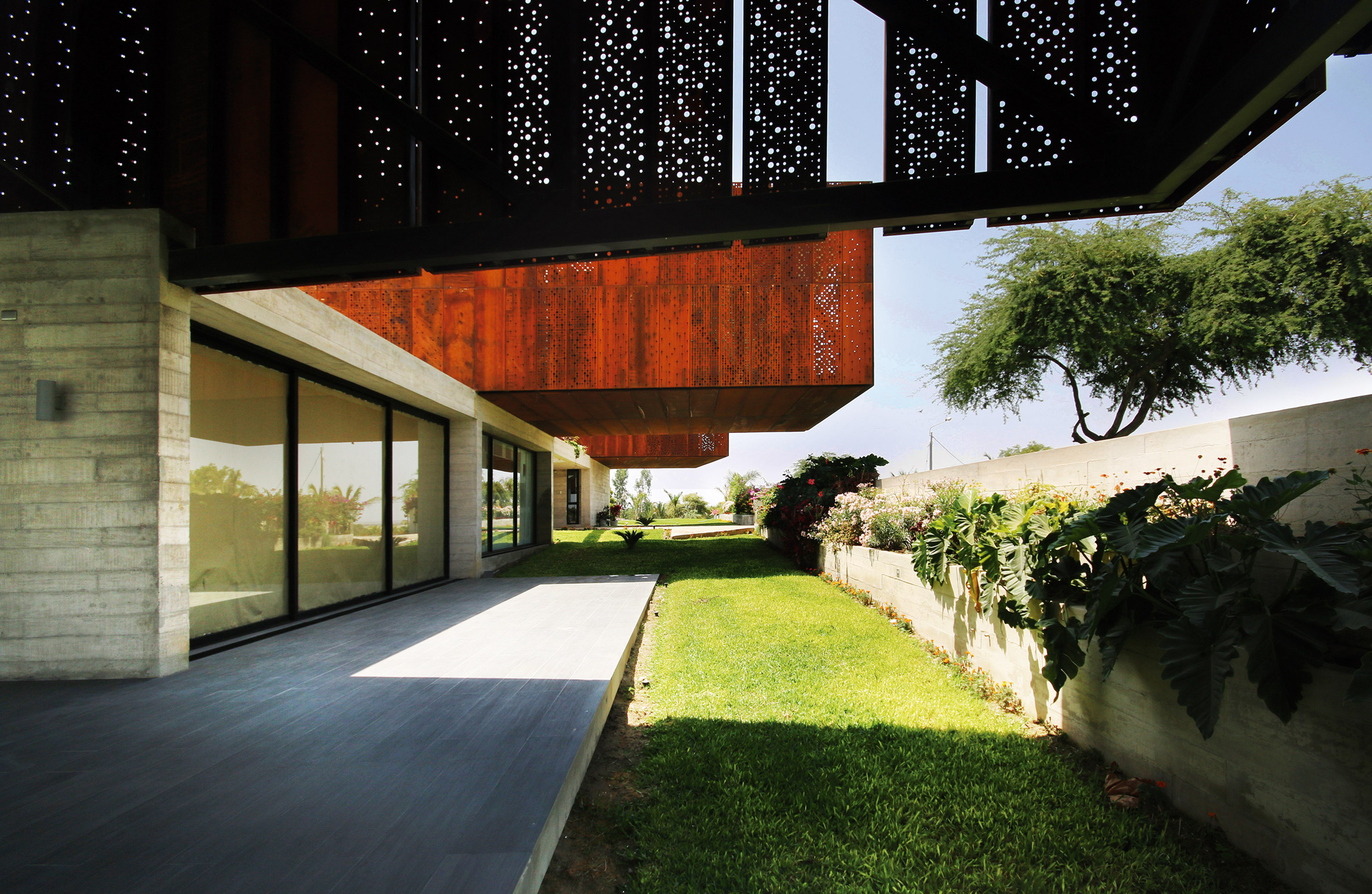 Cheng + Franco cantilever trio of Corten steel-clad volumes from rural Peruvian house-5