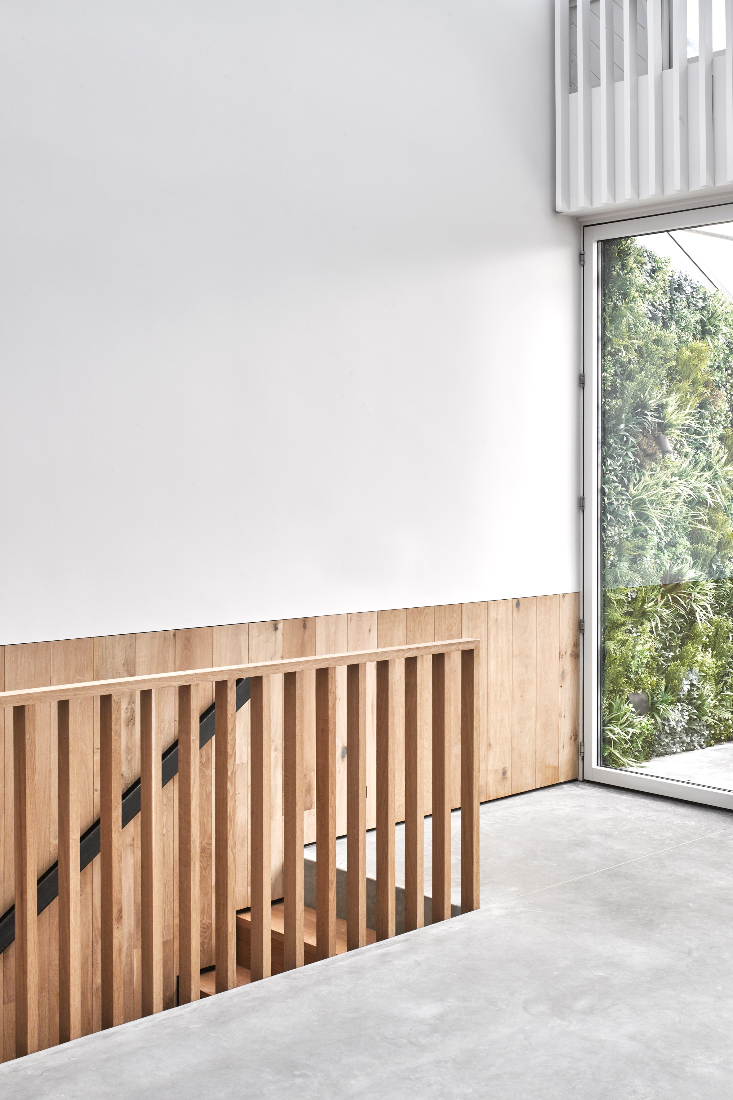 McLaren Excell contrasts smoked oak with white panelling in renovated London offices-16