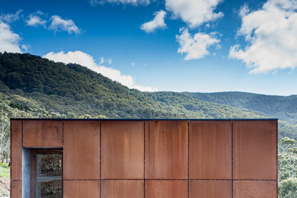 A Long, Narrow House Nestled into the Side of Mount Macedon-12