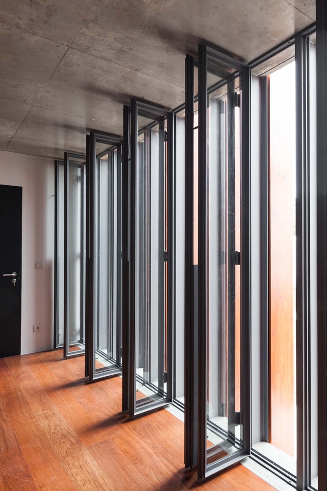 里斯本洛里什住宅 · 旧建筑新生命,彩色空间营造生活美学-47