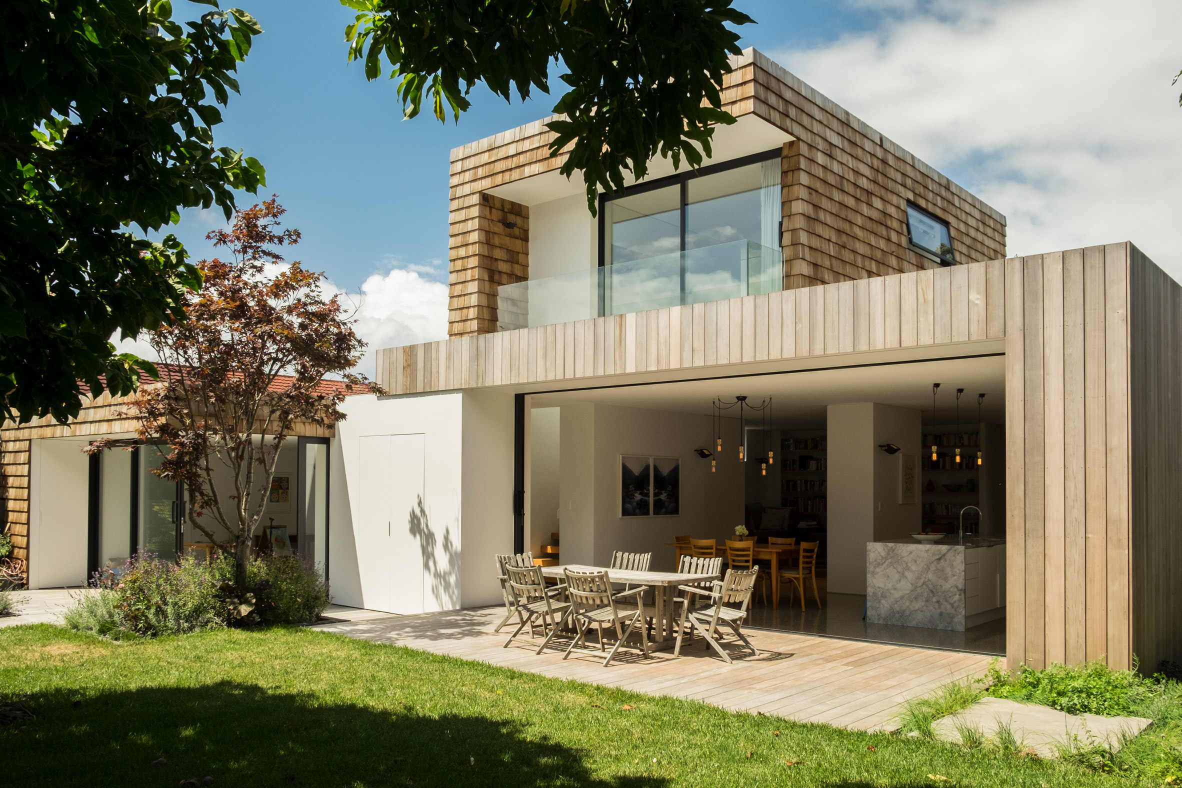 Gardens and terraces slot around timber extensions to Auckland house-2