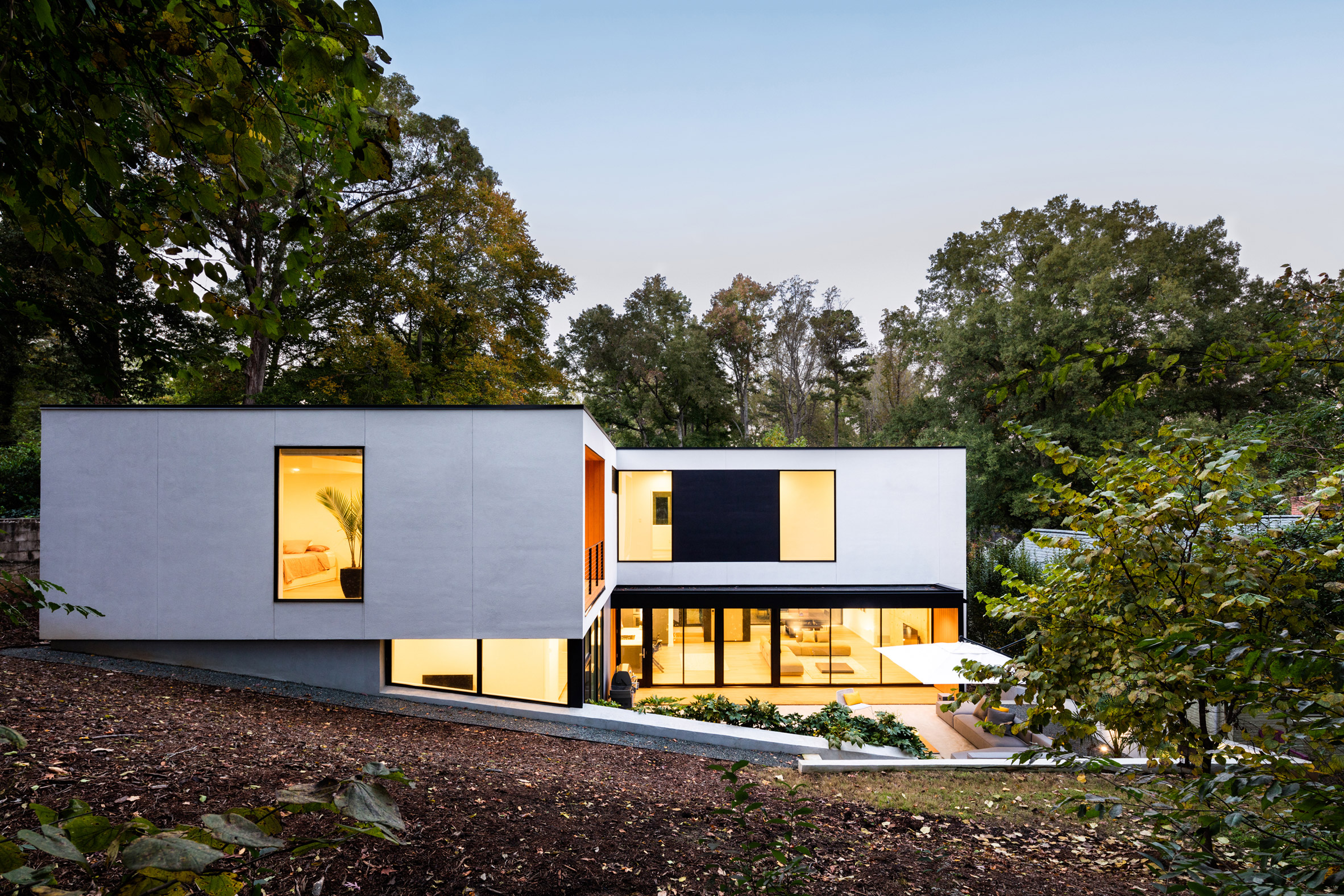 Black stairwell cuts across front of North Carolina home-21