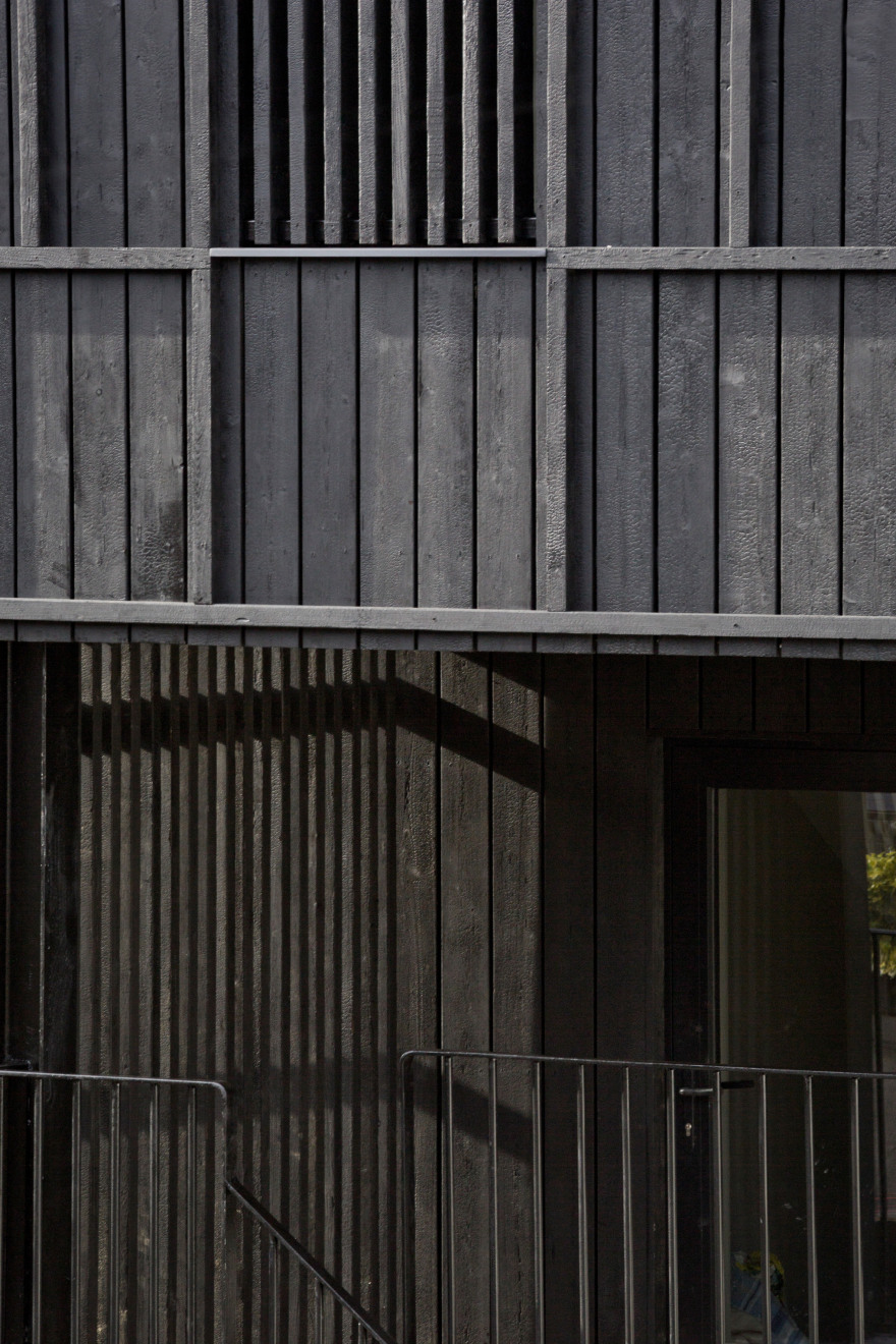 Scullion Architects adds charred-larch tower to terraced home in Dublin-19