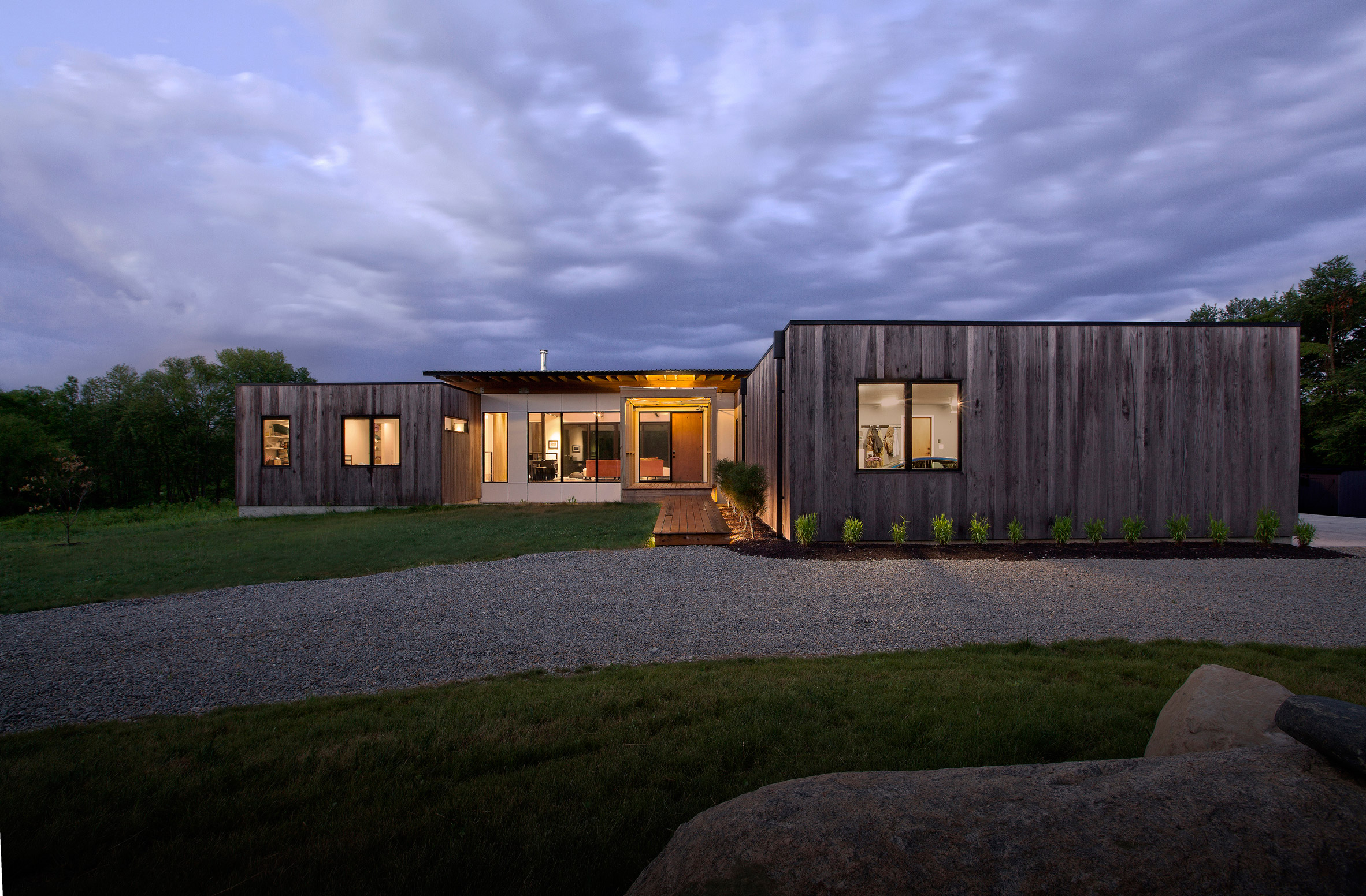 Haus wraps low-lying Indiana residence in thermally treated ash-23