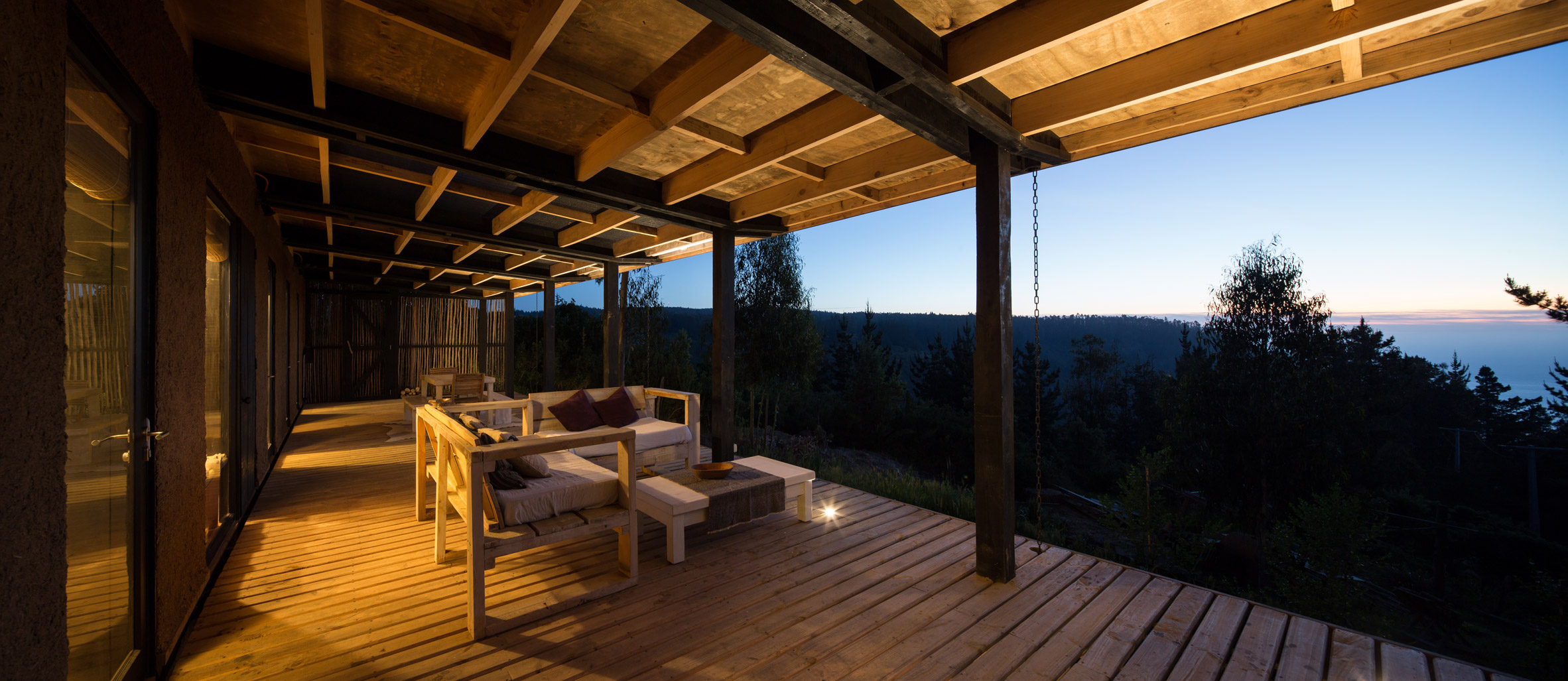 Studio Selva wraps Chilean surfers' retreat in eucalyptus screens-14
