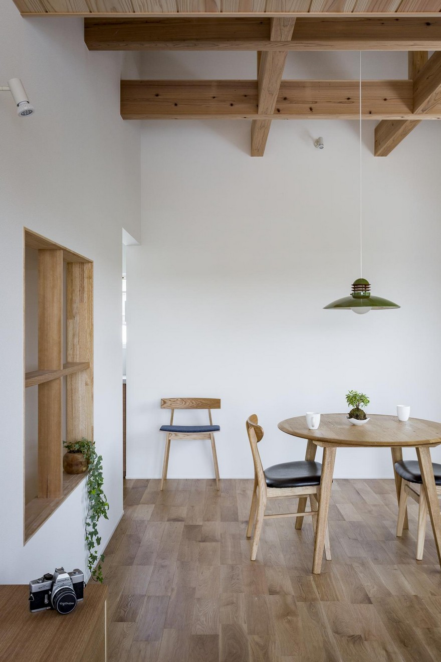 Box-Shaped Japanese Home with Warm Minimalist Interior Design-21